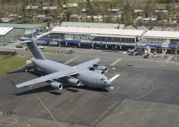 Port Vila - Royal Australian Air Force Aid Flight Unloading at NVVV